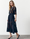 Юбка меди из тенсела Tencel Bloom Skirt Black 411 в черном цвете