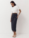 Чорна спідниця в горох з атлас-сатину Skirt Grace 412 декорована гіпюром